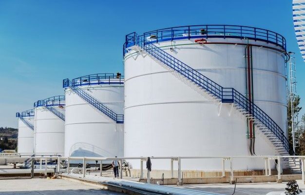 Premium Photo _ Picture of oil tanks at refinery_ sunny day_